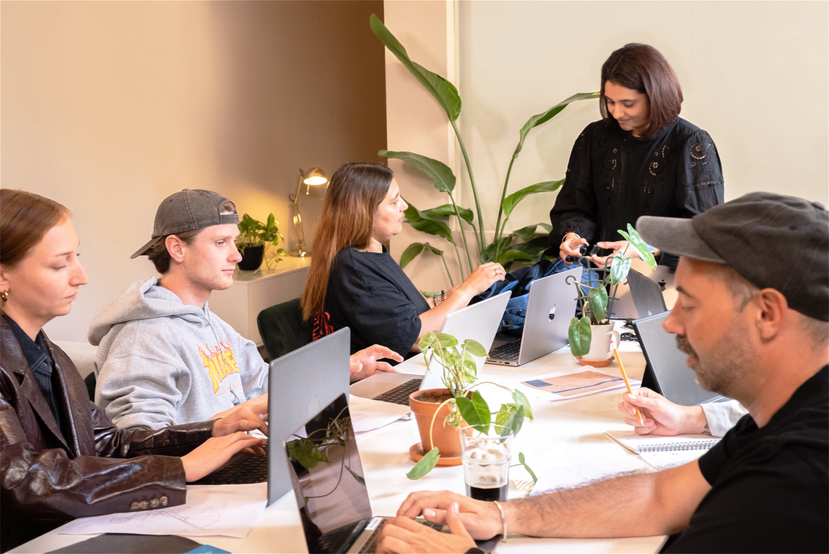 The Growgether team at work, reviewing products together